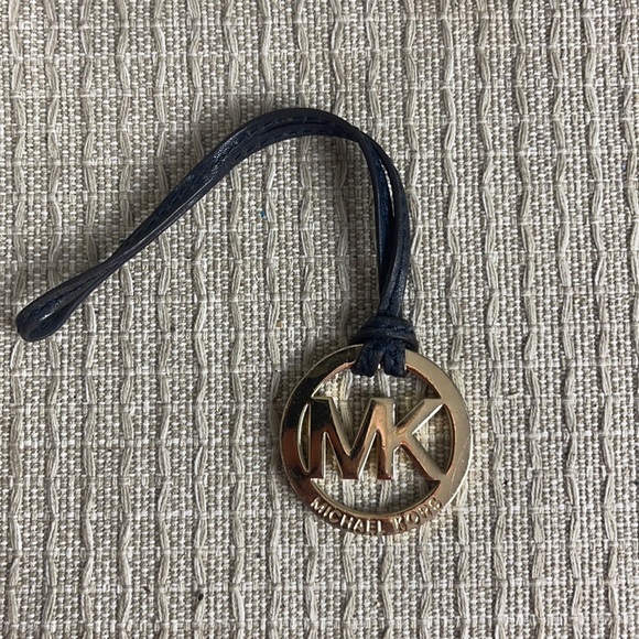 michael kors gold hang tag